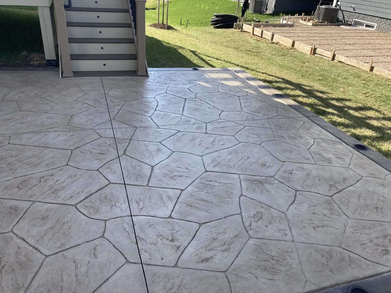 Paver driveway installation by Actaeon crew