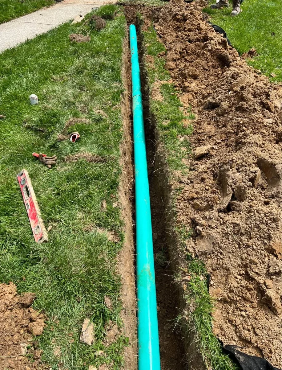 Drainage channel installation in a Virginia residential yard